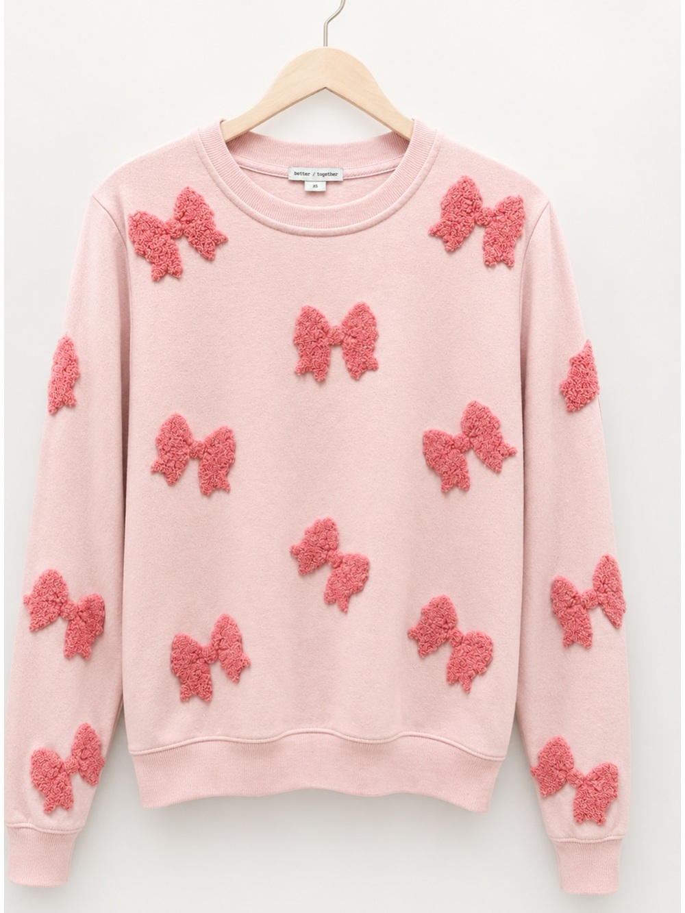 Pink Crewneck Sweater with Textured Bow Appliqués